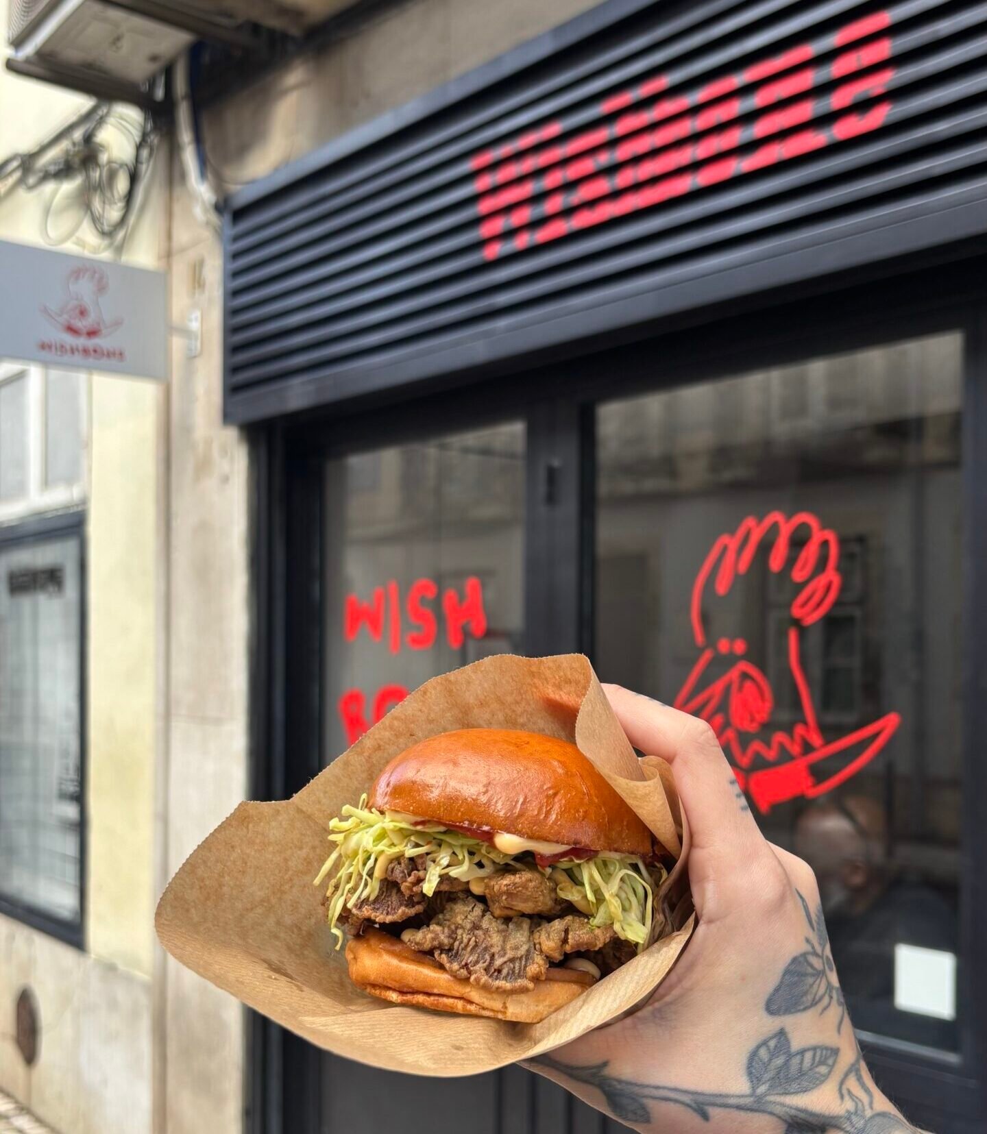 The Wishbone karaage mushroom sandwich, plant-based Japanese fried oyster mushroom on a vegan bun, in Bica, Lisbon