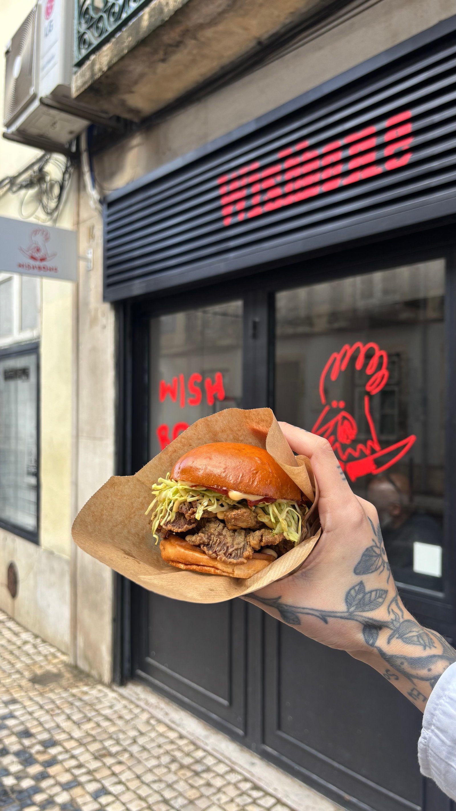 The Wishbone karaage mushroom sandwich, plant-based Japanese fried oyster mushroom on a vegan bun, in Bica, Lisbon